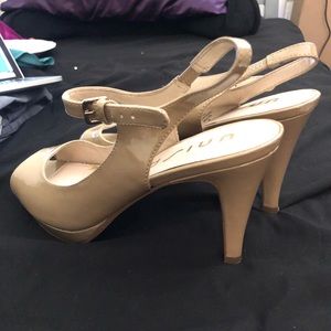 Nude pumps with open toe